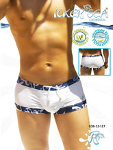 White swim trunks with navy blue patterned waistband and leg trim featuring drawstring closure by icker sea usa