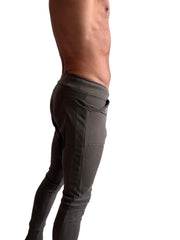 Long cuffed jogger and yoga sweat pants in dark gray slim fit with side pockets for athletic use