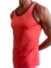 The perfect tank coral is a vibrant coral-red tank top with black trim and subtle side seam detail
