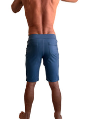 Back view of coral blue heather performance premium urban tactical dress shorts with fitted waistband and rear pockets