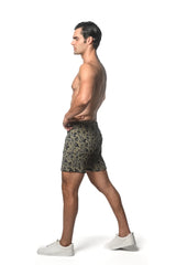 Men’s jacquard printed stretch knit shorts in olive green with subtle black floral pattern front view