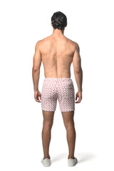Pink and white jacquard printed stretch knit short swim trunks with geometric pattern for casual wear