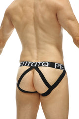 Black stretchy fabric briefs with bold white petitq logo waistband and distinctive crisscross design jockstrap arneke monti rainbow