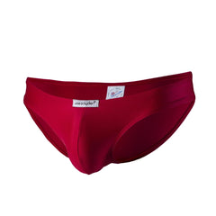 A vibrant red form-fitting men’s brief by joe snyder made of polyester in the joe snyder bikini classic style