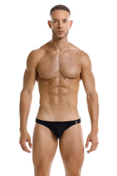 Black jor 2191 travel swim bikini briefs with subtle red and white logo on waistband perfect for swimming