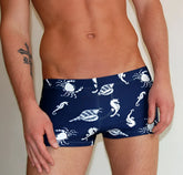 Navy blue js dirty industry sea animal square cut trunk swimwear with white seahorses crabs and shells pattern size m