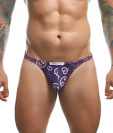 Purple patterned Justin + Simon classic tanga with love and circular designs in white pink and blue, front view