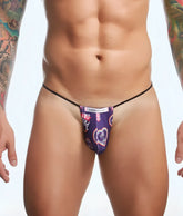 Purple patterned thong with black elastic waistband and heart design from justin kimmel in the justin simon collection