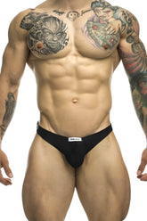 Black Justin Simon XSJ03 classic athletic briefs with white brand label on the waistband for active wear