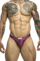 Purple satin briefs with a white brand tag at the waistband from justinsimon xsj03 classic thongs color wine collection