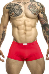 Justin+Simon classic coral red athletic briefs with a white brand tag on the waistband for active wear