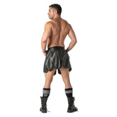 Black leather kinky gladiator skirt with flared pleated design and side slits for edgy fashion looks