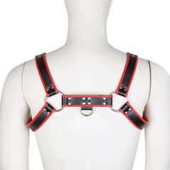 Mannequin's back wearing a black harness with red contrast trim and silver hardware.