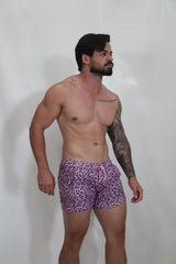 Purple leopard-print fleece shorts with matching drawstring designed for comfortable casual wear