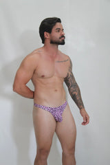 Purple leopard-print thong swimwear showing the back side made of stretchy fabric for beach use