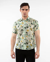 Lightweight cotton silk short-sleeved men’s shirt in light cream with yellow floral pattern and green leaves