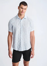 Light blue lightweight jacquard short-sleeved shirt with a subtle textured pattern perfect for warm weather