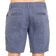 Blue linen slim fit shorts with a heathered denim look and subtle textured weave shown from the back side