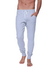 Long cuffed jogger and yoga sweat pants in light gray heather with white drawstring waistband and side pockets