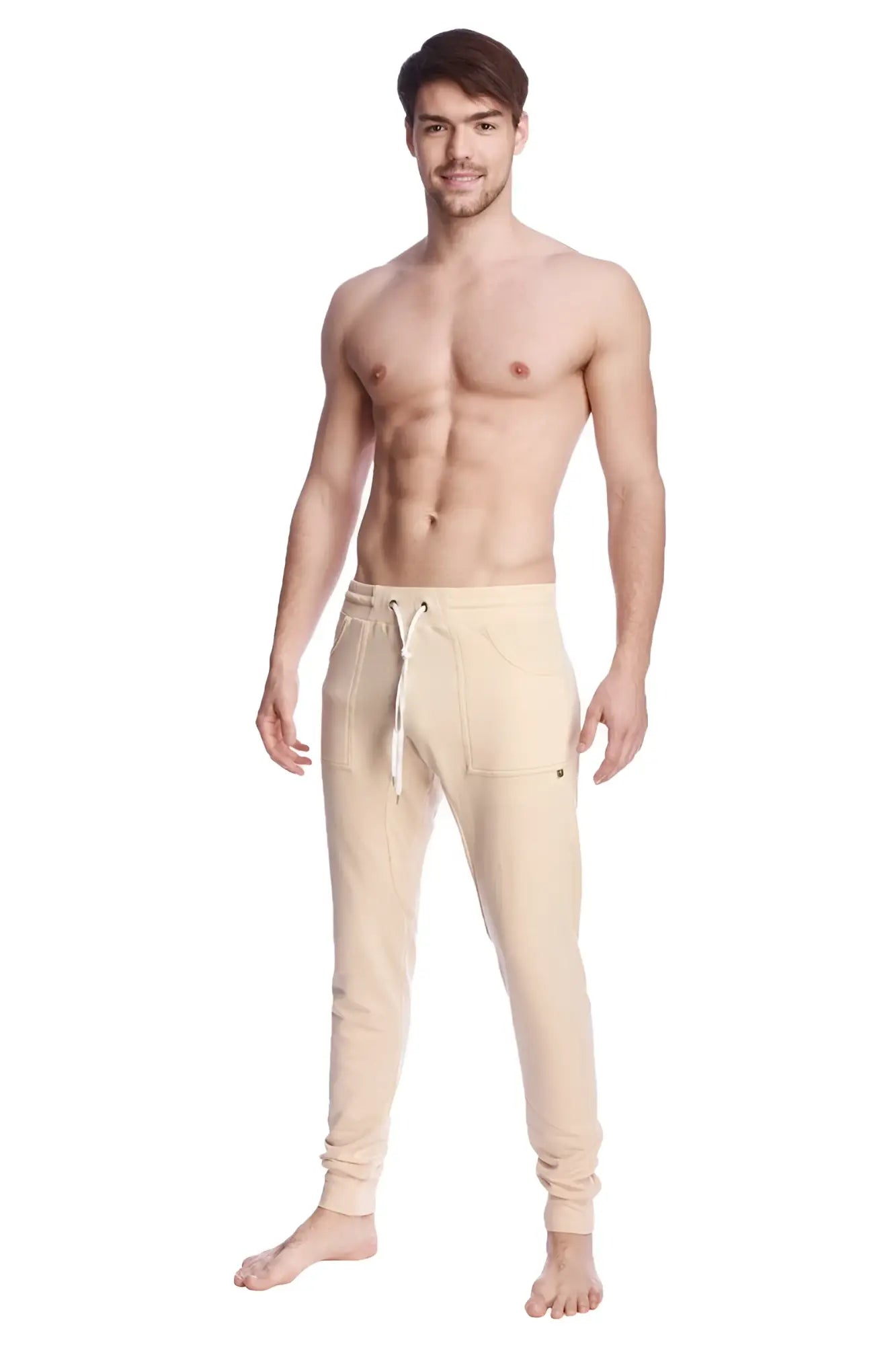 Long cuffed jogger and yoga sweat pants in sand beige with drawstring waistband and side pockets for comfort and style