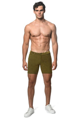 Olive green loopback stretch knit shorts made of textured denim for comfortable casual wear