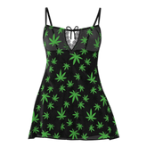 Black sleeveless magic silk dress with vibrant green marijuana leaf pattern and matching g-string set