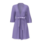 A lavender semi-sheer Magic Silk flutter sleeve robe with v-neckline and three-quarter length sleeves
