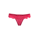 A vibrant fuchsia Magic Silk flutter thong made of lace with delicate floral patterns and a small side bow