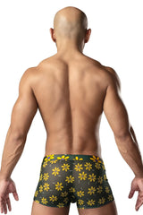 Dark green male power 145-285 petal power pouch boxer briefs with vibrant yellow daisy print floral pattern