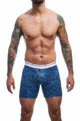 Blue patterned men’s boxer briefs with a white branded waistband designed for comfort by Malebasics