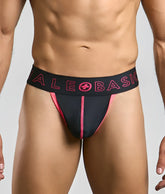 Black and pink male basics neon thong athletic briefs with bold logo waistband designed for active wear