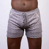 Gray and white mandala linen texture shorts with circular floral pattern and side pockets with zipper closures