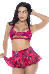 Vibrant pink and black snakeskin patterned two piece set with halter top cutouts and ruffled mini skirt by mapale