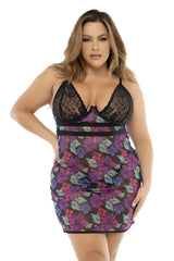 A plus-size woman wearing mapale 7497x babydoll with black lace-trimmed bodice and sheer floral skirt in purple pink teal