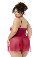 A plus-size woman wears a sheer deep red mapale 7620x babydoll with lace bodice and thin spaghetti straps with matching panty