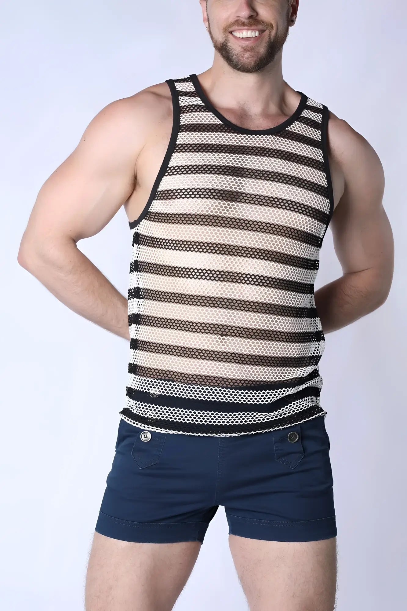 Mariner mesh stripe tank top with black and white striped mesh fabric, round neckline, and elasticated hem