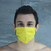 Bright yellow McKillop polypropylene unisex face mask with black trim in one size for everyday use