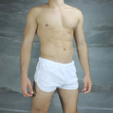 White mckillop vivid score athletic shorts with elastic waistband and clean design in size s