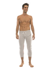 Mens 4/5 zipper pocket capri yoga pants in light gray with white drawstring and side pockets designed for comfort
