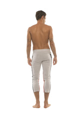 Mens white athletic capri pants with black and red side stripes designed for yoga and casual wear