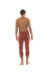 Mens 4/5 zipper pocket capri yoga pants in solid cinnabar red with smooth rust-red reflective fabric