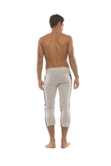 Mens white athletic capri pants with black and red side stripes designed for yoga and casual wear