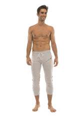 Mens 4/5 zipper pocket capri yoga pants in light gray with white drawstring and side pockets designed for comfort