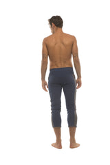 Mens navy blue capri yoga pants with subtle side stripes and 4 5 zipper pockets for activewear use