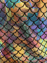 Merman tank featuring iridescent mermaid-scale fabric with holographic finish and black outlined scales