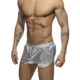 Shiny silver metallic shorts with a drawstring waistband and side pockets from the metallic short collection