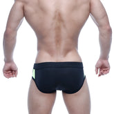 Black swim trunks with neon green side panels from metromalewear alonzo swim brief green 4997-07 for men