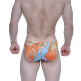 Orange and blue patterned swim trunks with ornate floral design from metro male wear antique bikini 5103-m68