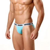 Light blue MetroMaleWear Asian bikini briefs with white waistband and black repeating lettering for athletic use