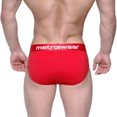 Red metrowear briefs with white logo waistband featuring soft breathable fabric for comfortable daily wear